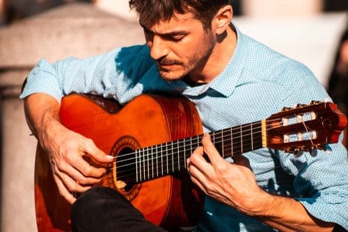 London,/,United,Kingdom,-,2.15.2019:,A,Handsome,Male,Guitar