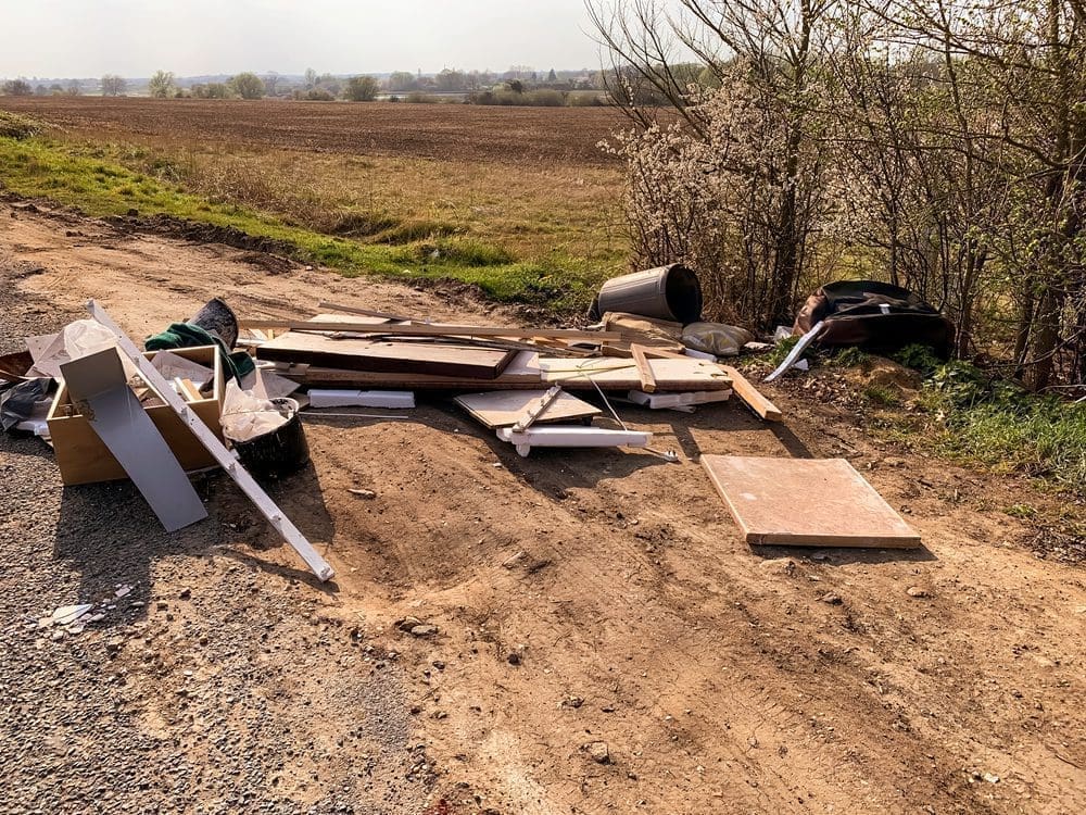 illegal dumping on dirt road