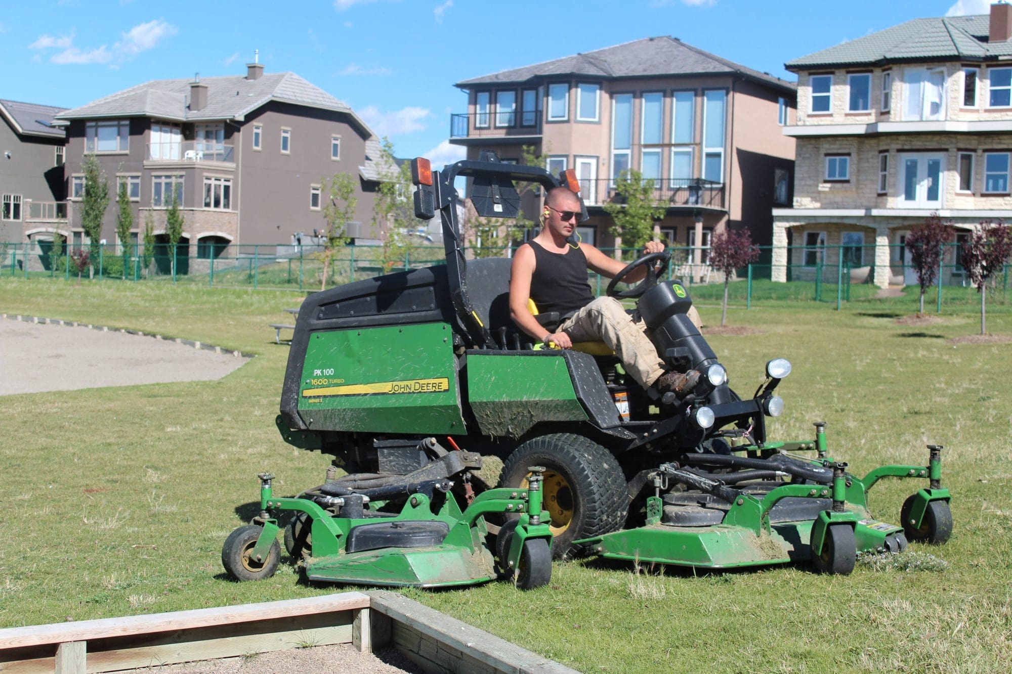 summer parks maintenance lawn mower