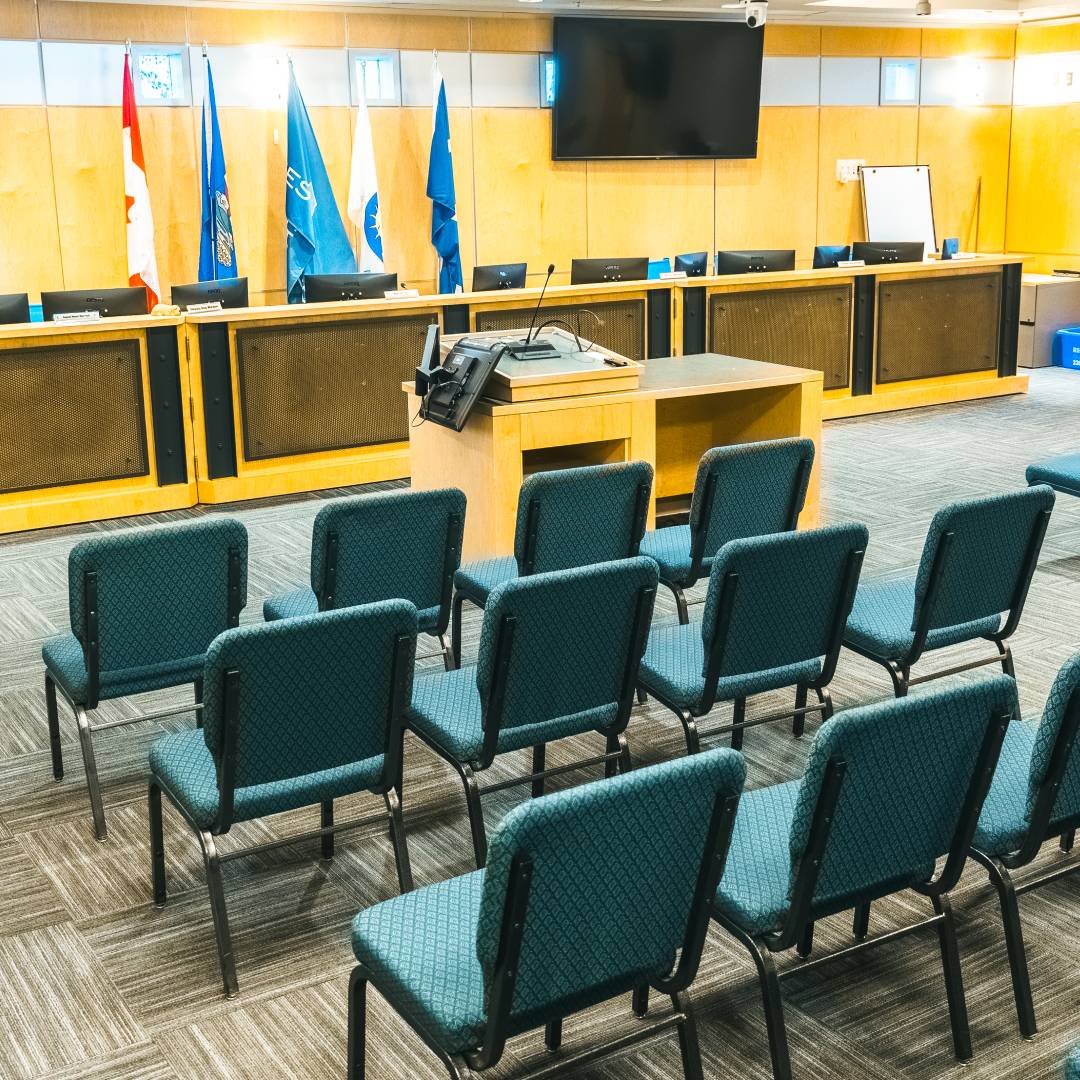 Vacant chairs sit empty in Council Chambers
